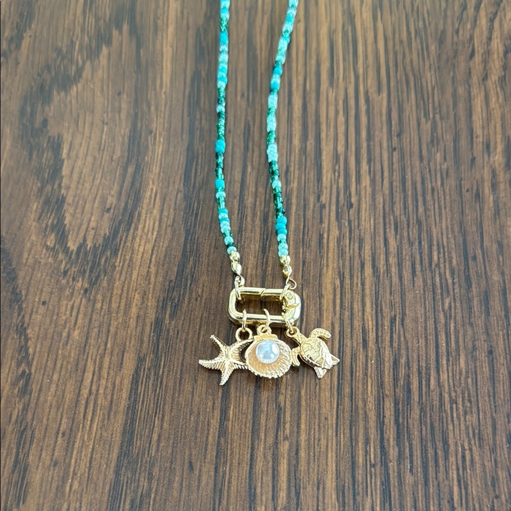 Turquoise and Gold Charm Necklace